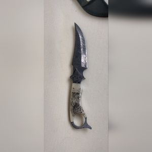 Damascus 11 inch knife with right handed 2 way sheath. Good condition.